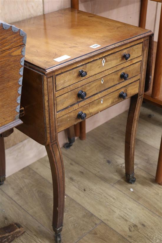 A Regency mahogany drop-flap work table, ebony line-inlaid, W.52cm